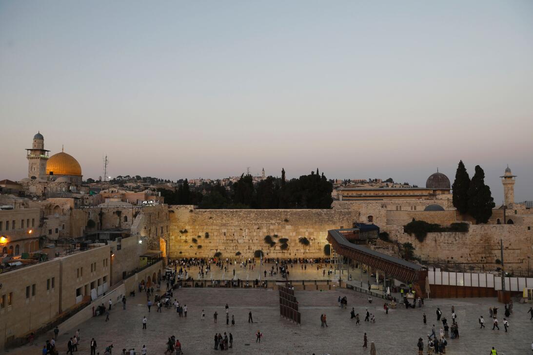 A general view shows Orthodox Jewish men and women gathering at the West...