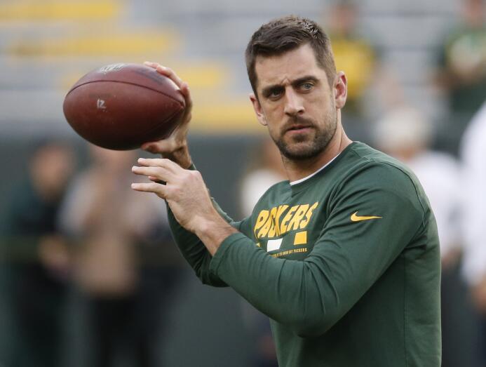 Aaron Rodgers llamó a la unidad: Público y jugadores le respondieron ap-...