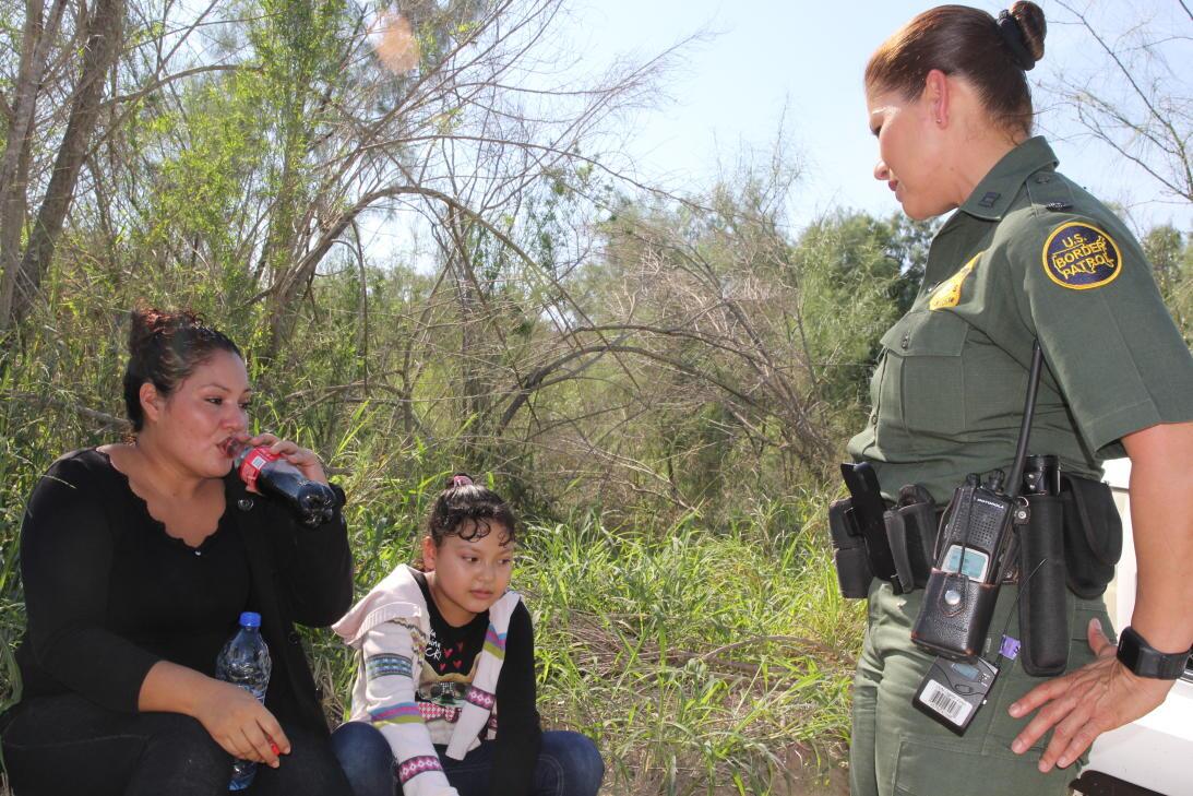 "Why are you crying?" agent Marlene Castro asks a Salvadoran w...