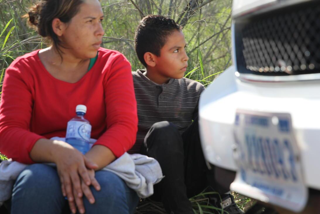 Nelson, 9, with his mother. Nearly 7 of every 10 migrants who were arres...